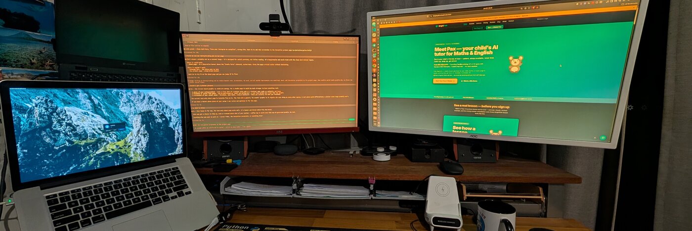 The TelaLoom studio — triple monitor setup with BrightPath and Claude Code open